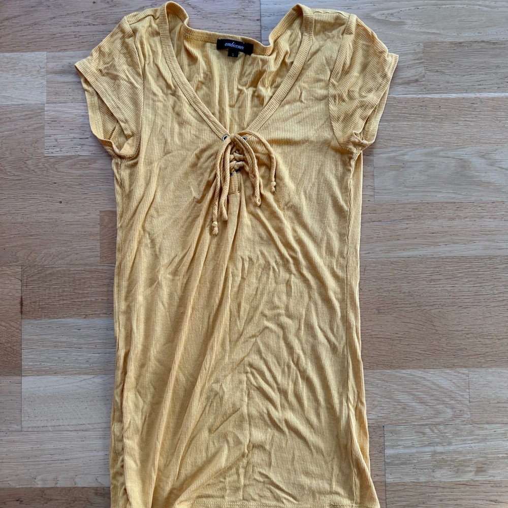 tight yellow skinny shirt